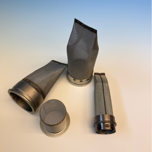 A group of spark arrestors against a blue and peach background